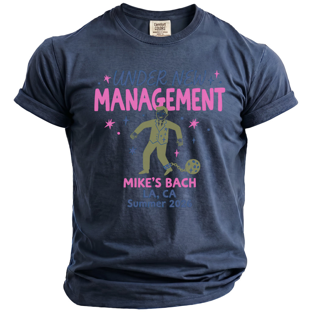 Dark blue t-shirt with "Under New Management" and "Mike's Bach" text, and graphic.