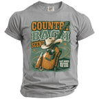 Country Bash Scene graphic with guitar, cowboy hat, sunglasses, and bottle on a t-shirt.