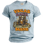 Light blue t-shirt with skeleton playing poker, reads "Vegas Bach Scene".