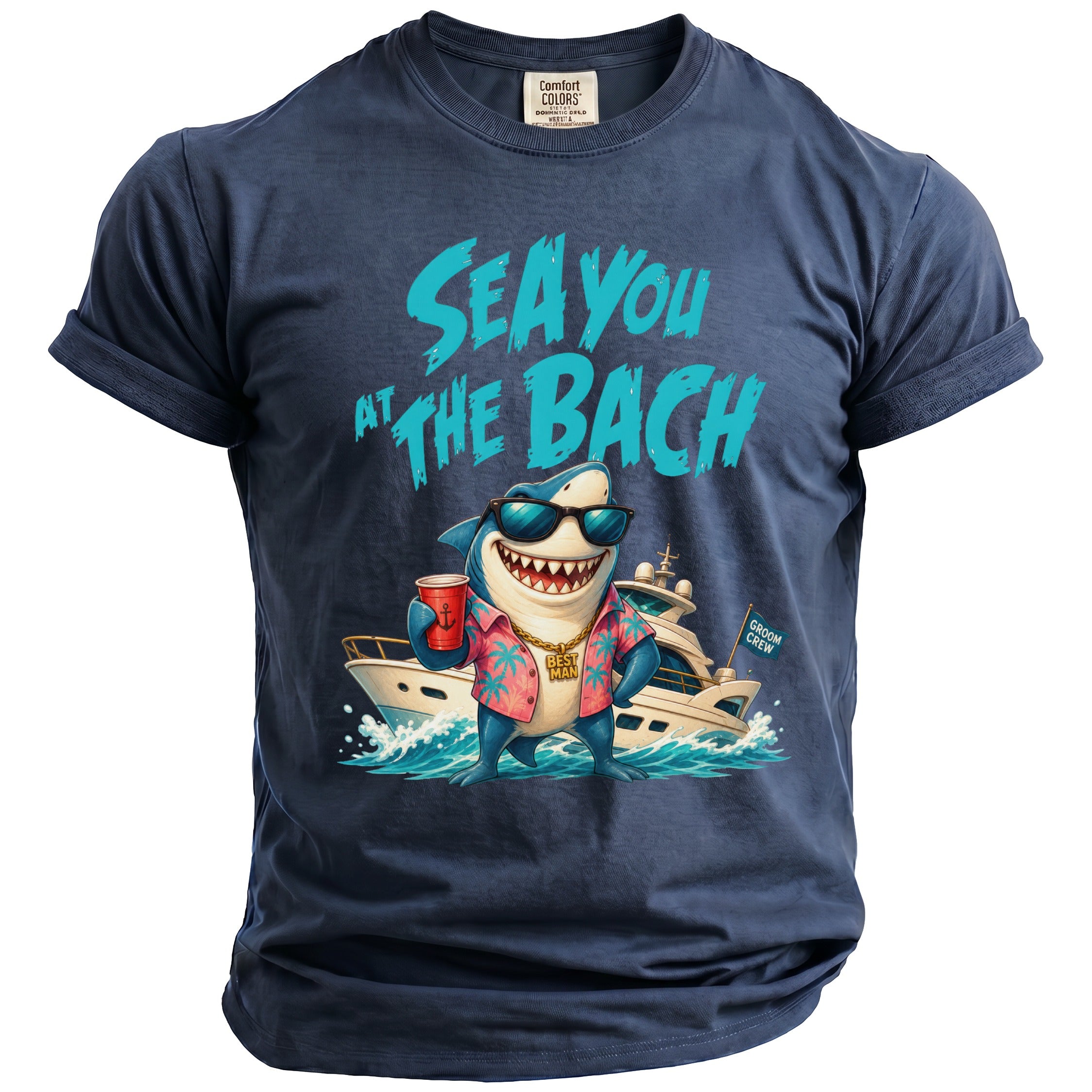 Navy blue short-sleeve t-shirt with a graphic of a cartoon shark wearing sunglasses, a shirt, and a gold chain, holding a red cup on a yacht, with the text SEA YOU AT THE BACH.
