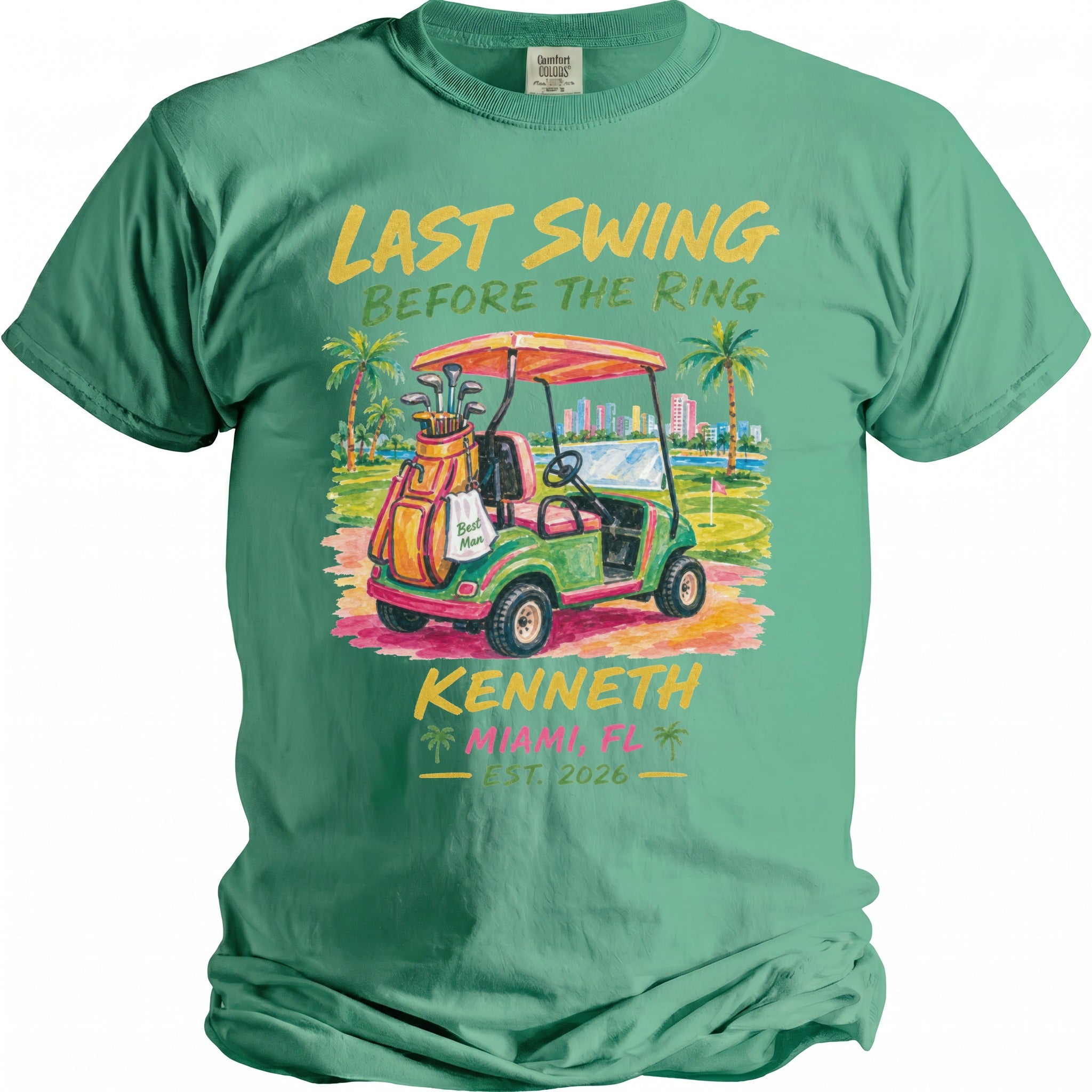 Green t-shirt with "Last Swing Before the Ring," Kenneth, Miami FL, Est. 2026, and golf cart graphic.