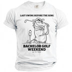 White t-shirt with cartoon dragon golfing, text: LAST SWING BEFORE THE RING BACHELOR GOLF WEEKEND.