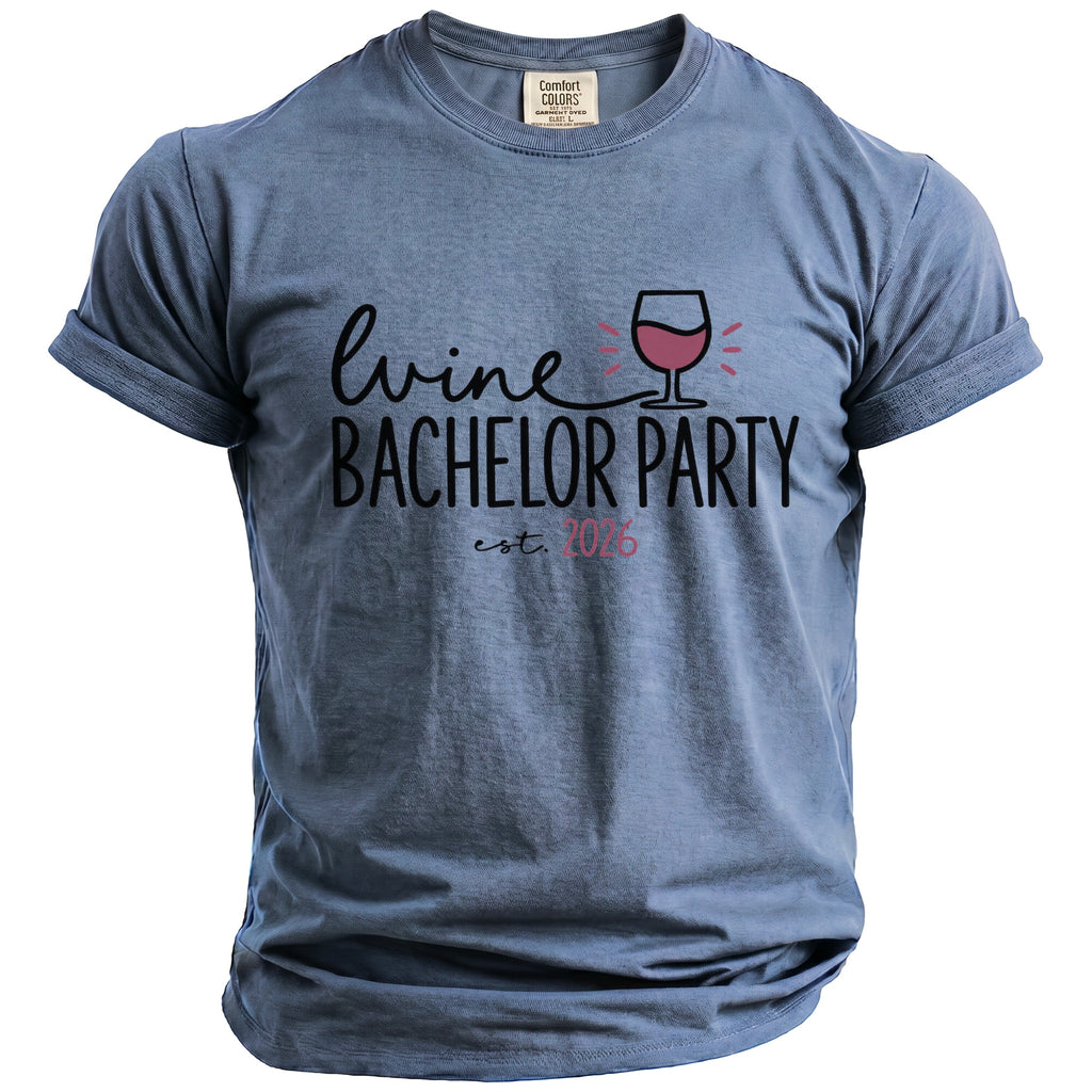 Blue t-shirt with "Wine Bachelor Party est. 2026" text and wine glass graphic.