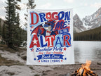 "Dragon Me To The Altar" bachelor party banner with a dragon character and text, outdoors near a lake.