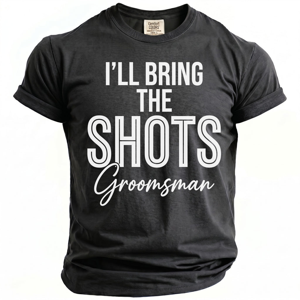 Dark grey t-shirt with white text "I'LL BRING THE SHOTS Groomsman".