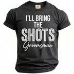 Dark grey t-shirt with white text "I'LL BRING THE SHOTS Groomsman".