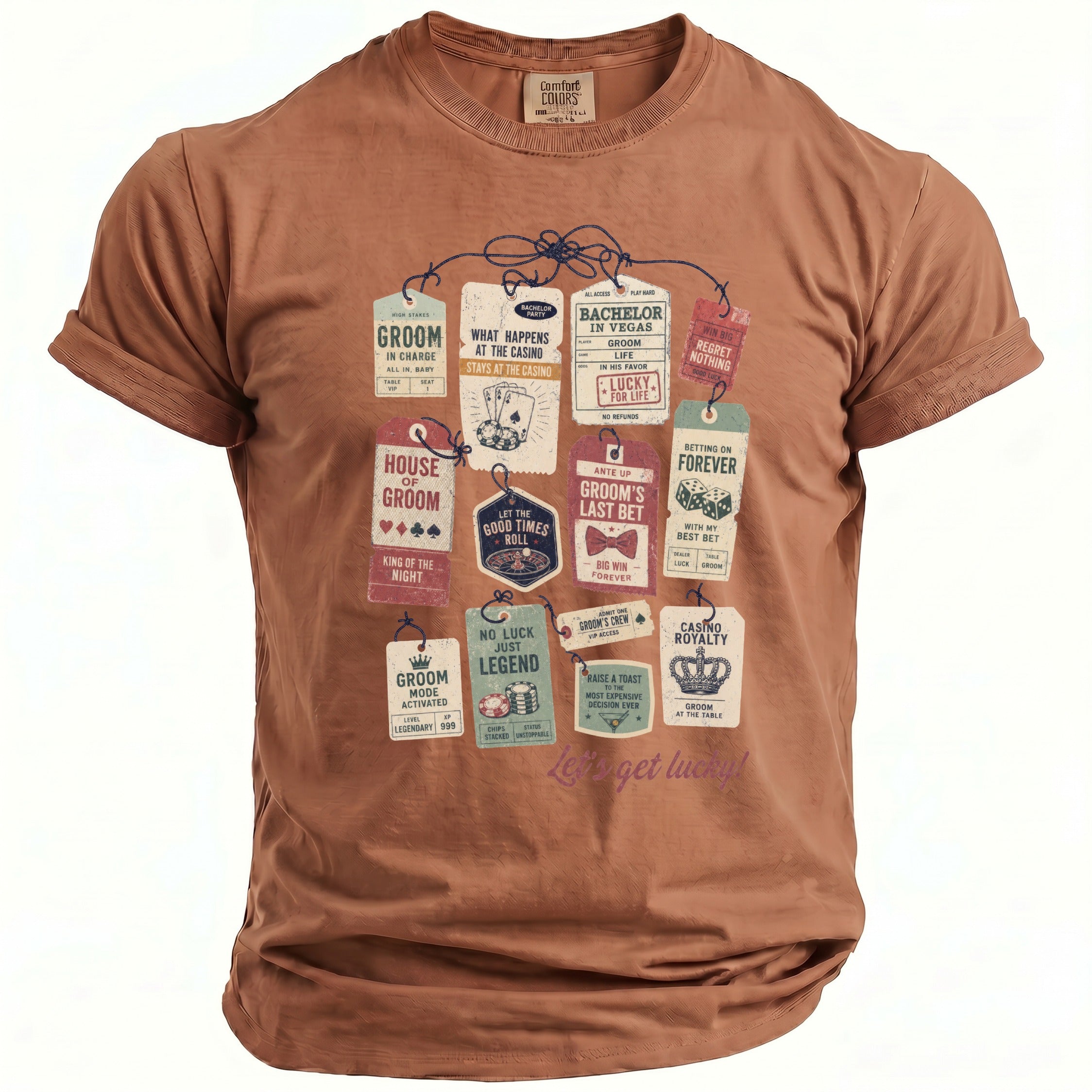Brown t-shirt with casino-themed tags: Groom in charge, Bachelor in Vegas, and Casino Royalty.
