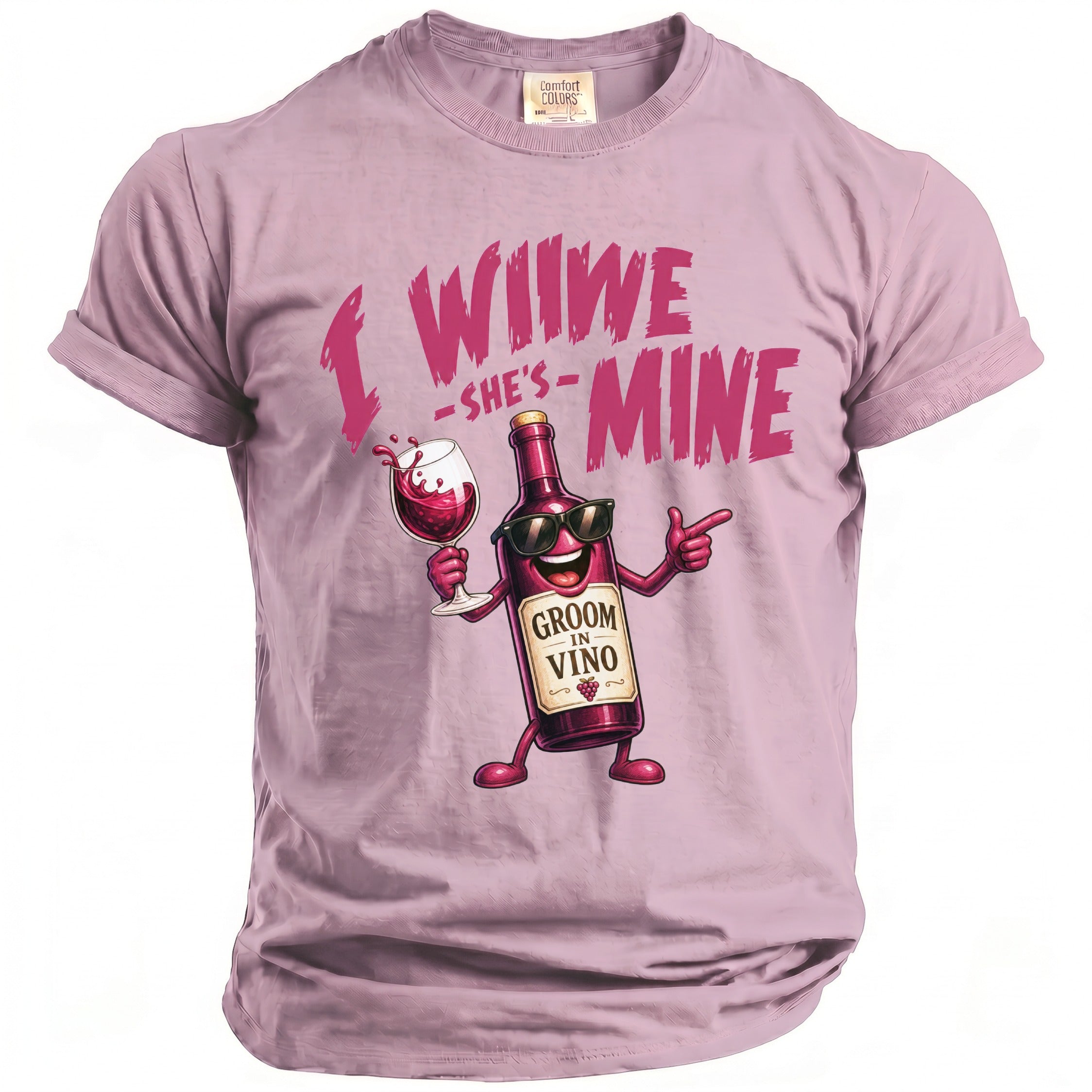 Pink t-shirt with wine bottle graphic reading "I WIIWE -SHE'S- MINE" and "GROOM IN VINO".