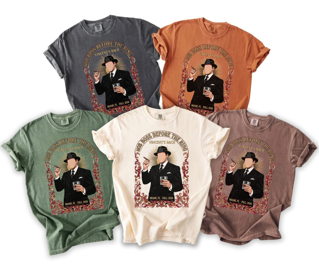T-shirts with a graphic of a man in a suit holding a cigar and drink.