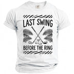 White t-shirt with "LAST SWING BEFORE THE RING" text and golf illustration.