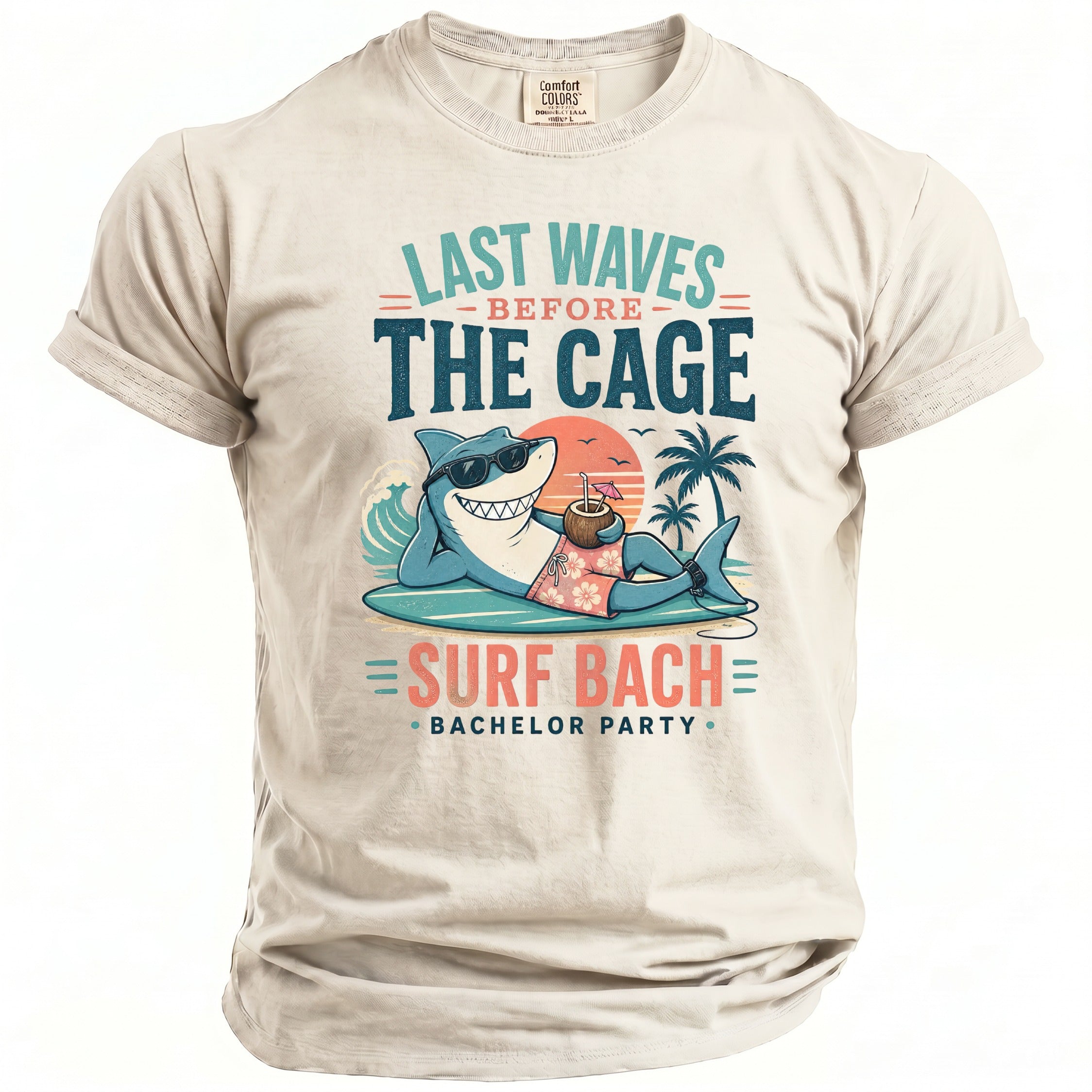 T-shirt graphic with shark on surfboard, text "Last Waves Before The Cage" and "Surf Bach Bachelor Party".