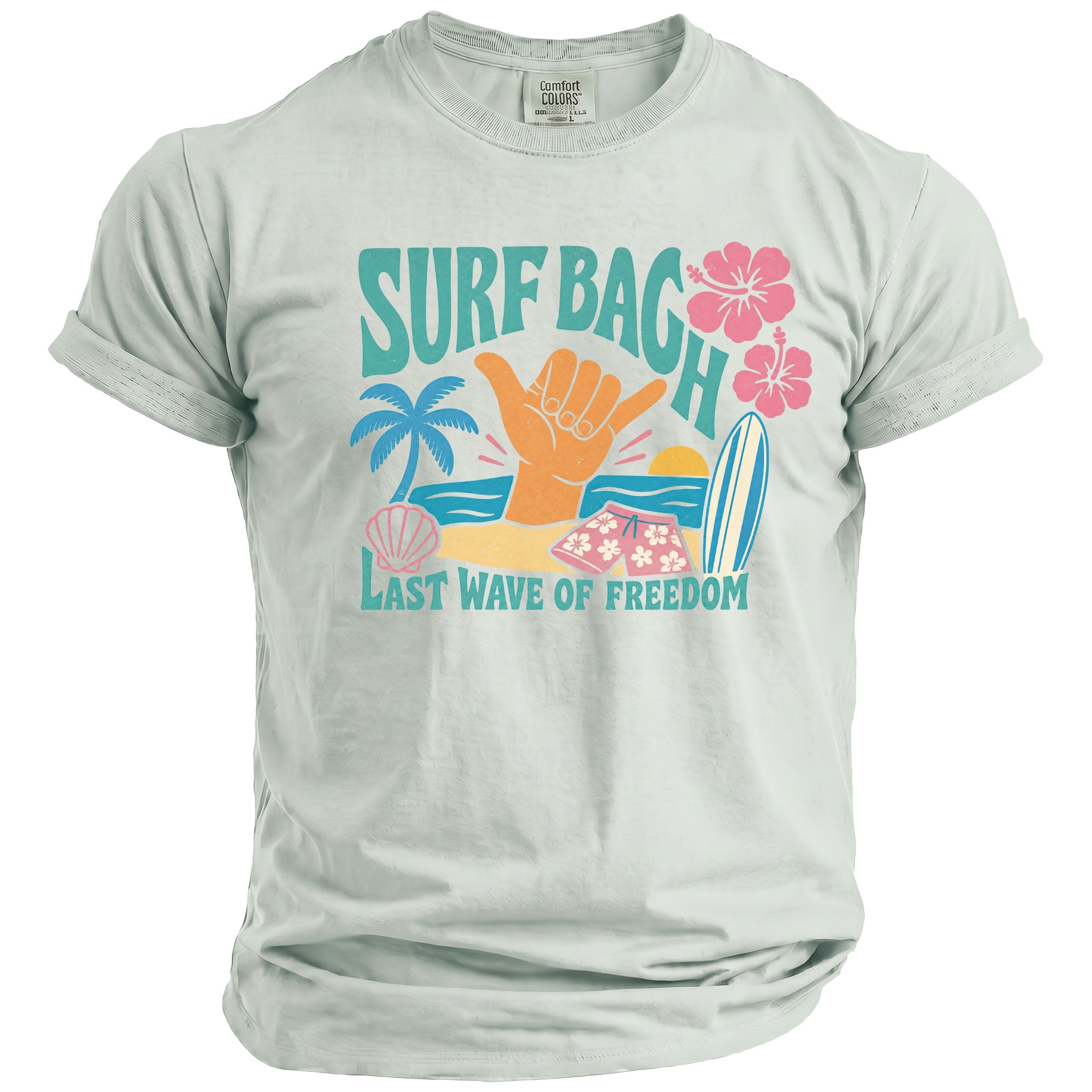 Light blue t-shirt with "SURF BAG H" and "LAST WAVE OF FREEDOM" text with beach graphics.