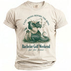 Dragon golfing on a "Bachelor Golf Weekend" t-shirt with text "Last Swing Before The Ring".