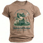 T-shirt with a dragon golfing, stating "Bachelor Golf Weekend".