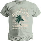 Bachelor Beach Club shirt with palm tree and "Groom's Last Wave 2026" text.