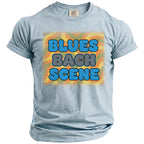Light blue t-shirt with "BLUES BACH SCENE" in retro bubble font.