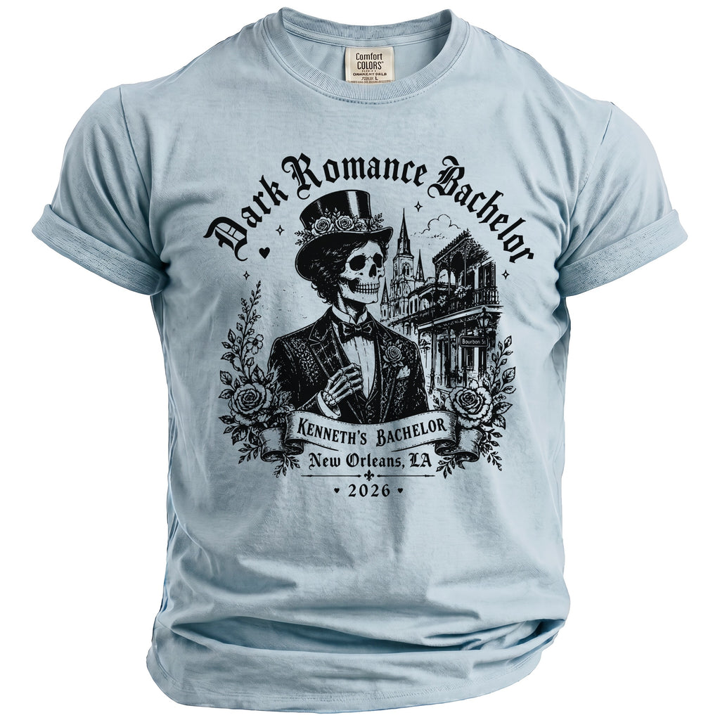 Light blue t-shirt with "Dark Romance Bachelor, Kenneth's Bachelor, New Orleans, LA, 2026" graphic.