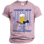 Pink t-shirt with "Under New Management" and cigar themed graphic.