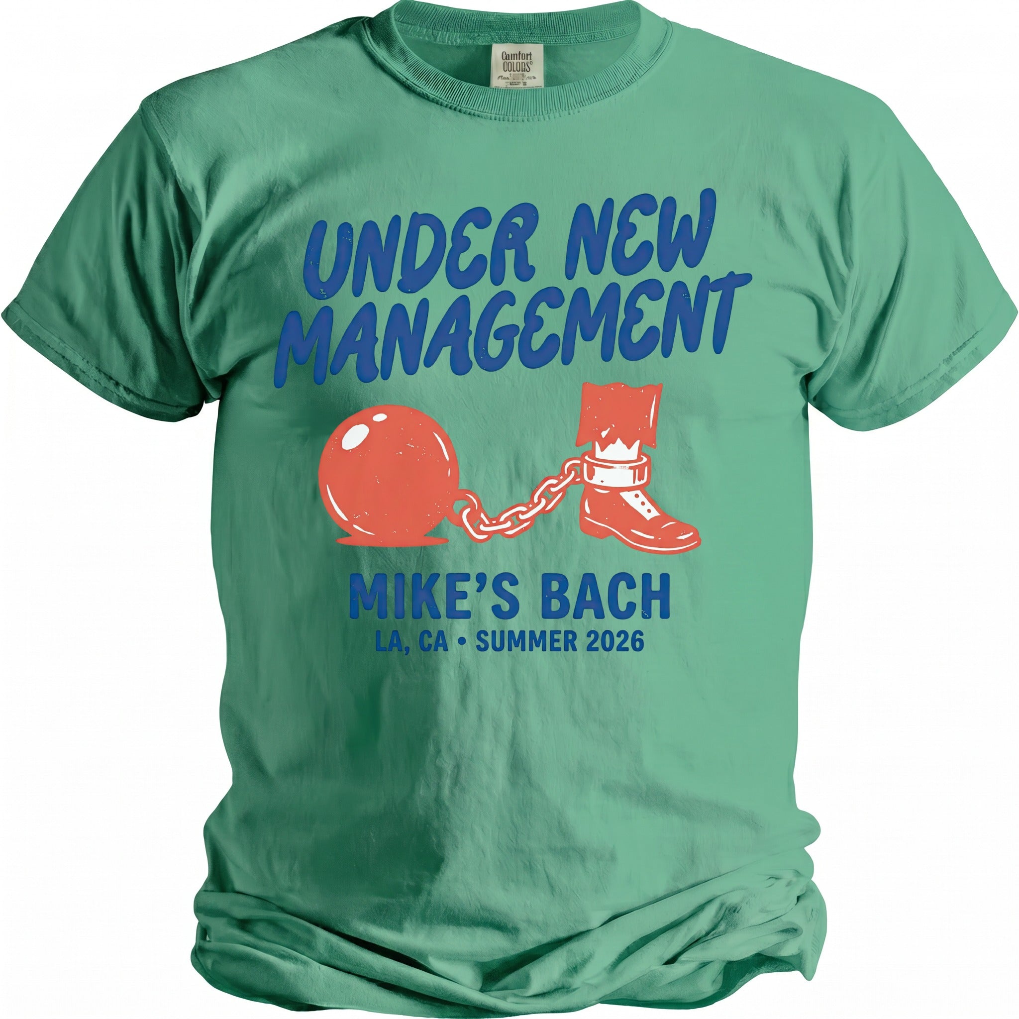Green t-shirt with "UNDER NEW MANAGEMENT" and a ball and chain graphic.