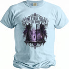 Light blue t-shirt with gothic gate design and text "Some Curses Follow You Home".