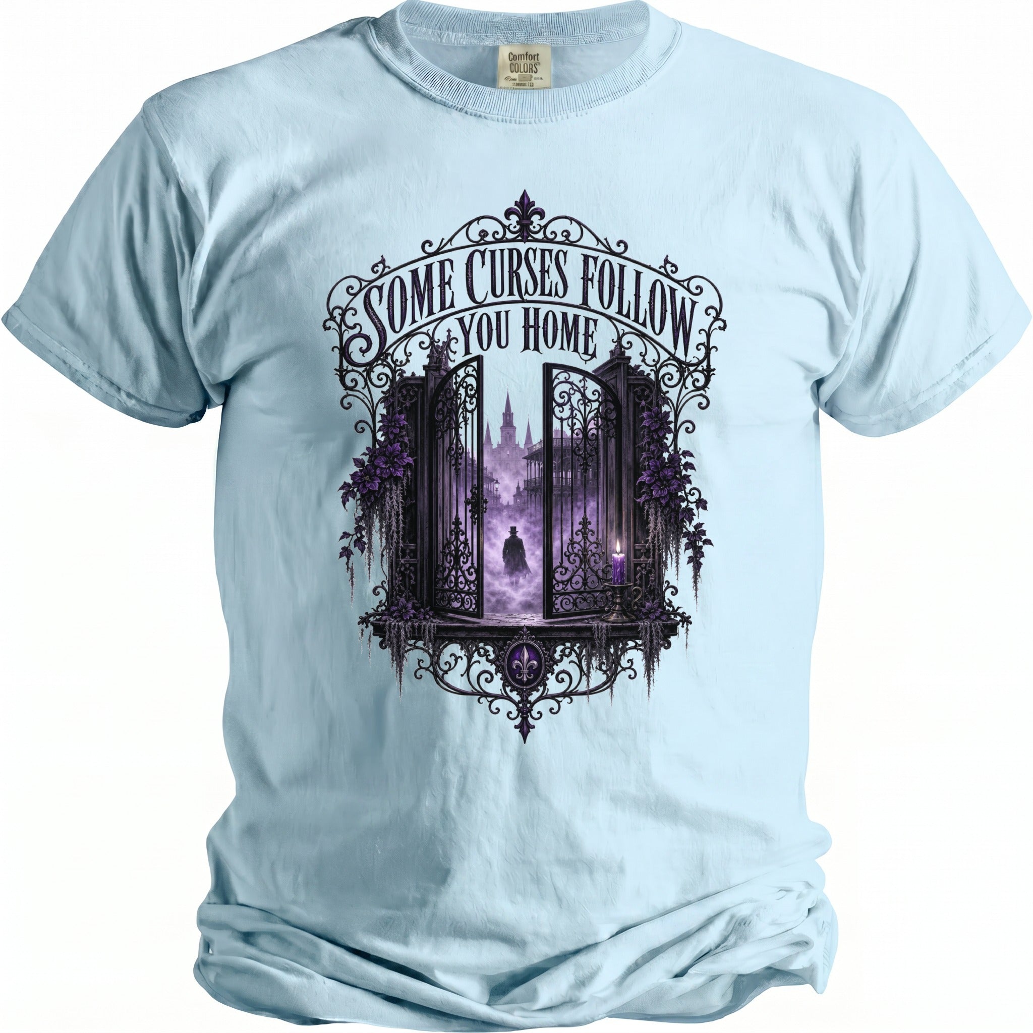 Light blue t-shirt with gothic gate design and text "Some Curses Follow You Home".