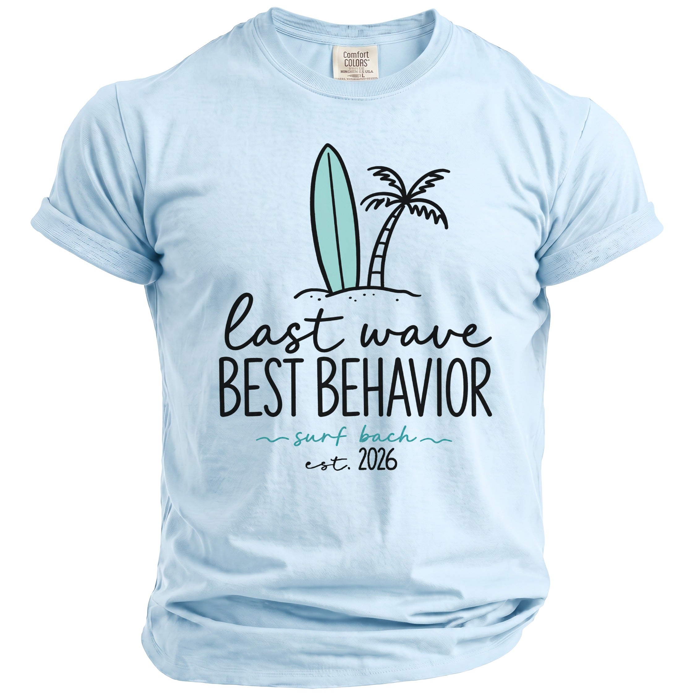 Light blue t-shirt with surfboard, palm tree, and text "last wave BEST BEHAVIOR surf bach est. 2026".