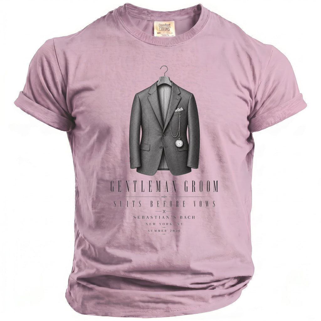 Pink t-shirt with "Gentleman Groom" graphic of a suit, pocket watch, and text.