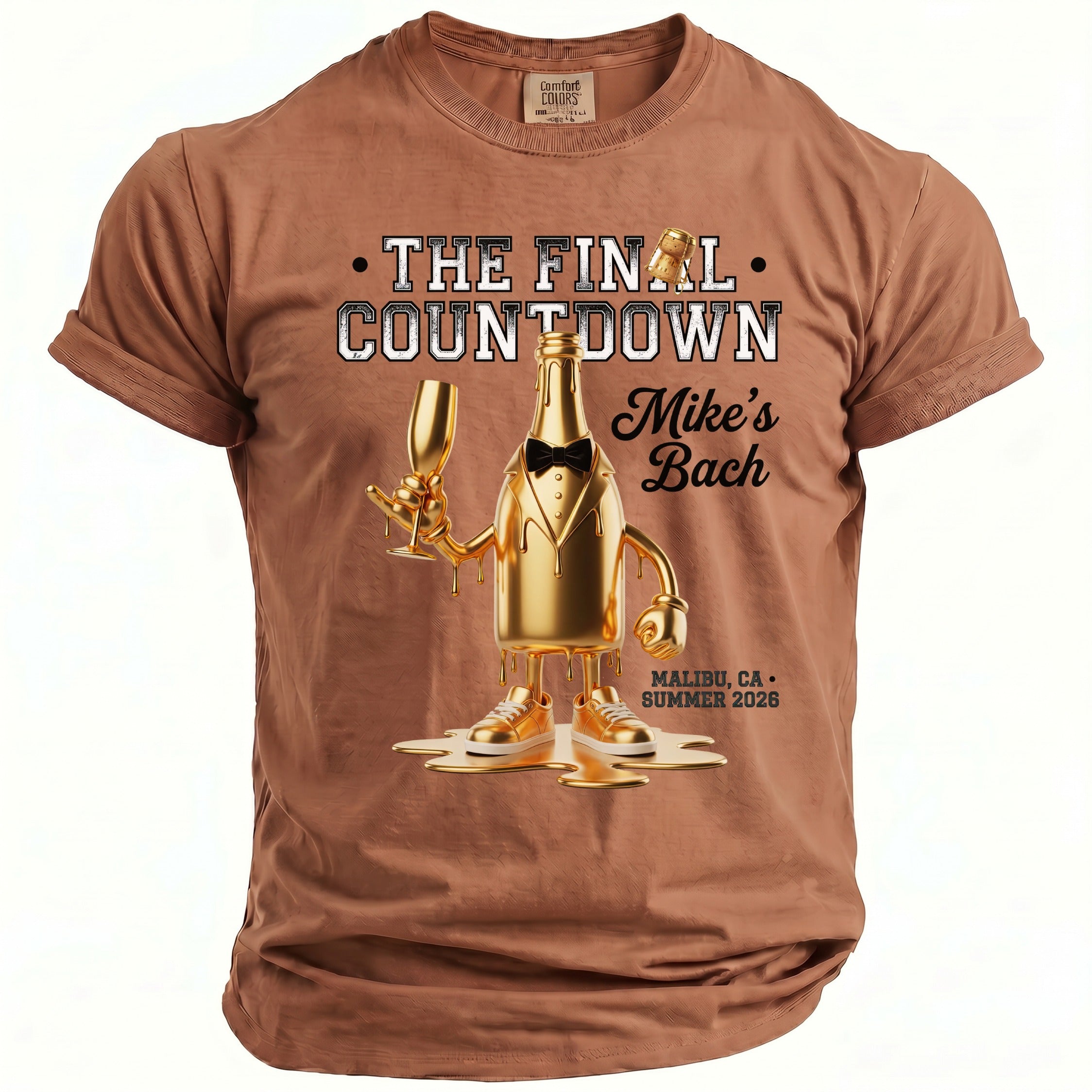Brown t-shirt with "The Final Countdown" and a gold bottle illustration for Mike's Bach.