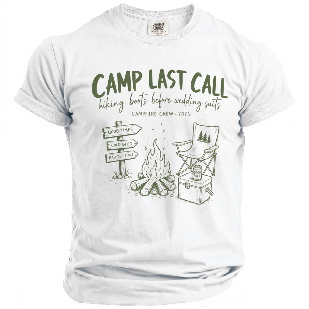 White t-shirt with "Camp Last Call" design featuring campfire, signs, and camping chair.