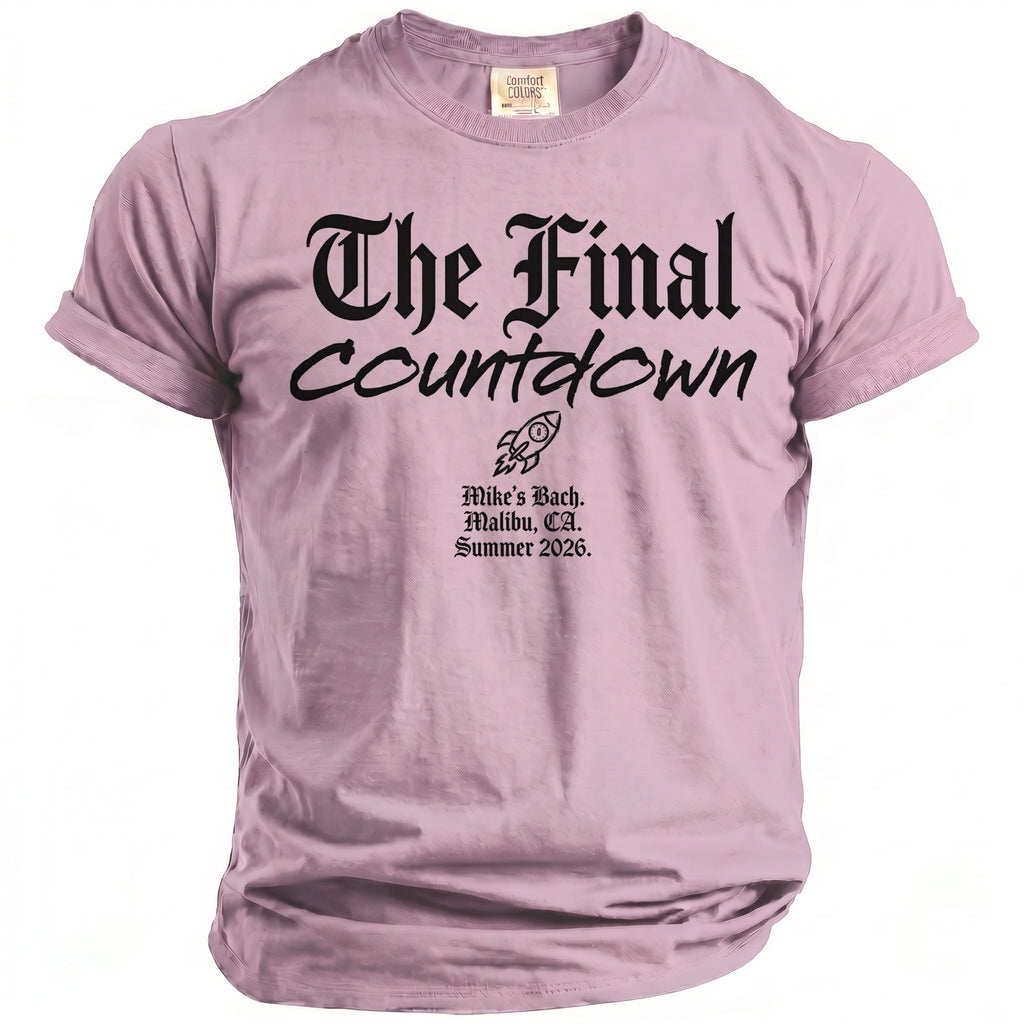 Pink t-shirt with black gothic text "The Final Countdown" and rocket graphic.