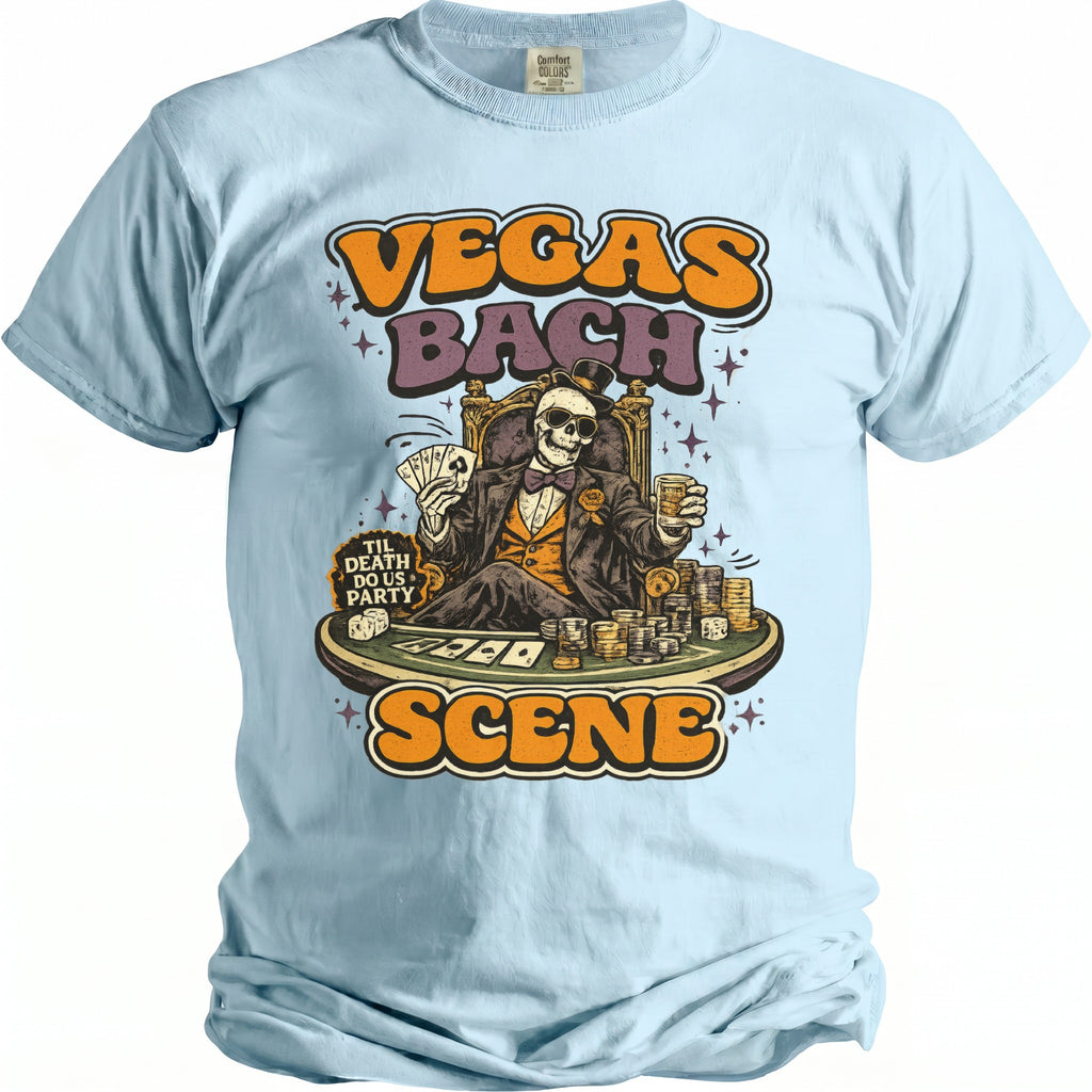 Light blue t-shirt with Vegas Bach Scene graphic featuring a skeleton gambler.