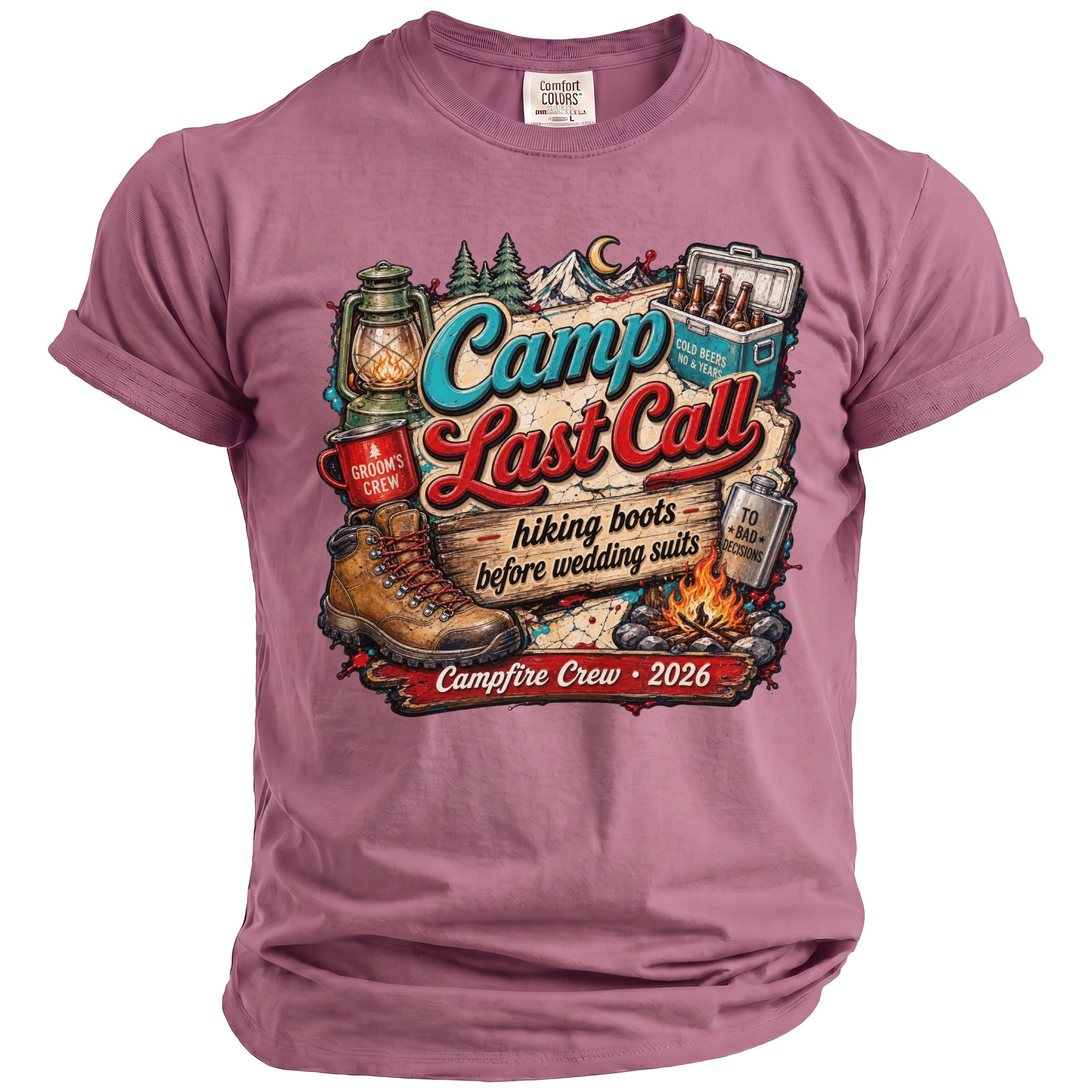 Mauve t-shirt featuring a camping graphic with text reading Camp Last Call, hiking boots before wedding suits, and Campfire Crew 2026.