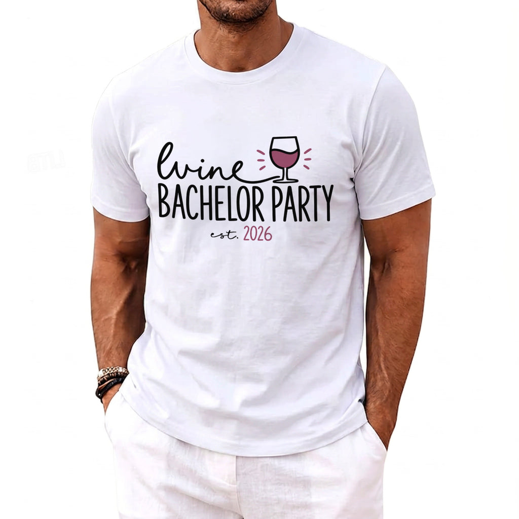 White t-shirt with "Wine Bachelor Party est. 2026" and wine glass graphic.
