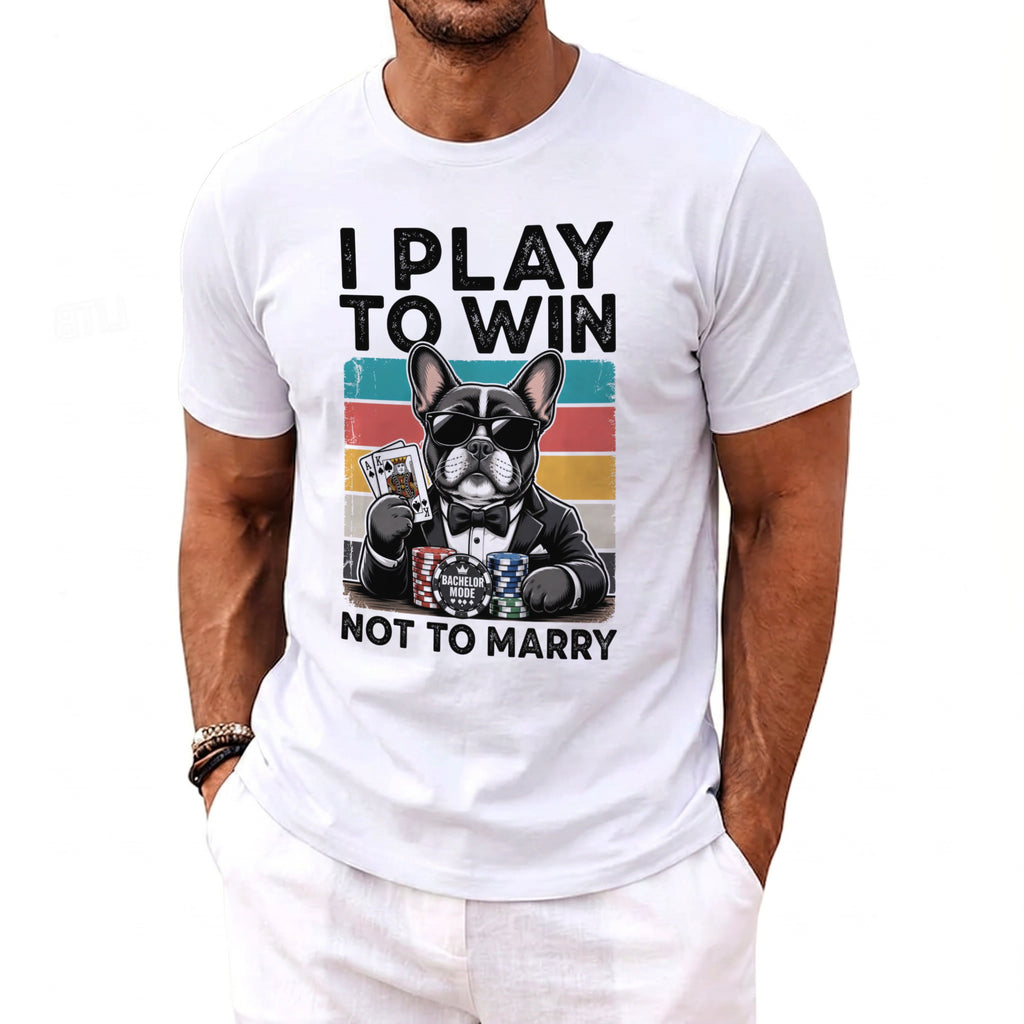 French bulldog in sunglasses and tuxedo with cards and poker chips, text "I PLAY TO WIN NOT TO MARRY".