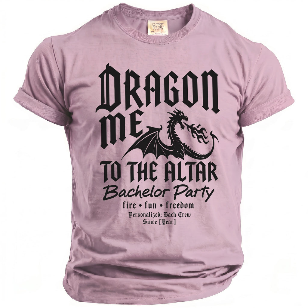 Pink t-shirt with "Dragon Me To The Altar Bachelor Party" text.