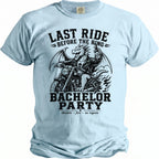 Light blue t-shirt with a black graphic of a dragon on a motorcycle holding a beer, titled "Last Ride Before The Ring" and "Bachelor Party".