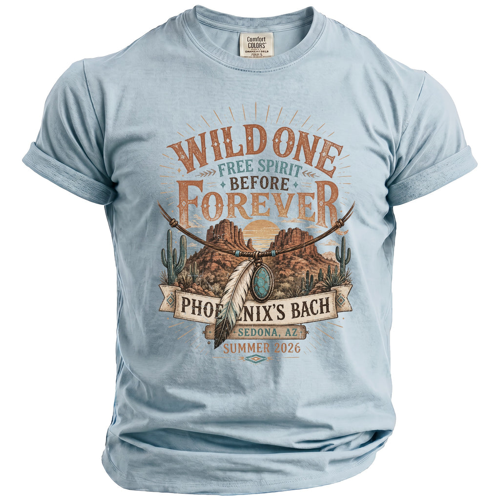 Light blue t-shirt with "Wild One Free Spirit Before Forever Phoenix's Bach Sedona, AZ Summer 2026" graphic.