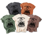 Several t-shirts with a dragon graphic and text "Bachelor Party" and "Rolling the Dice".