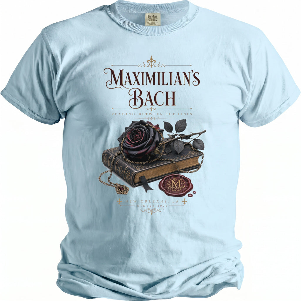 Light blue t-shirt with "Maximilian's Bach" and a dark rose on a book.