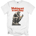 White t-shirt with "Making art is not easy" and The Thinker holding a palette.