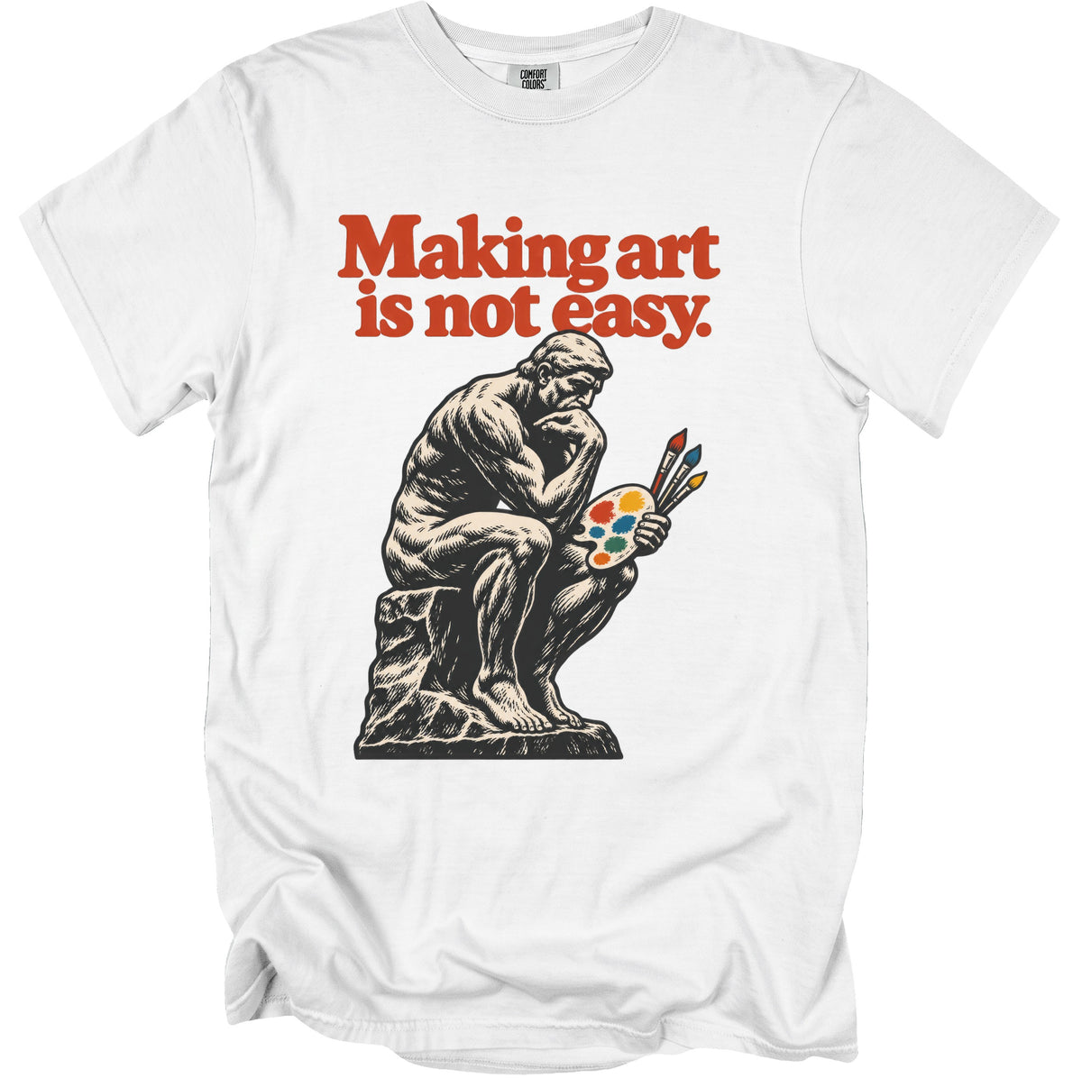 White t-shirt with "Making art is not easy" and The Thinker holding a palette.