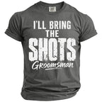 Gray t-shirt with white distressed text that reads "I'LL BRING THE SHOTS Groomsman."