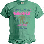 Green t-shirt graphic: "Under New Management," a man with a ball and chain, "Mike's Bach LA, CA Summer 2026."