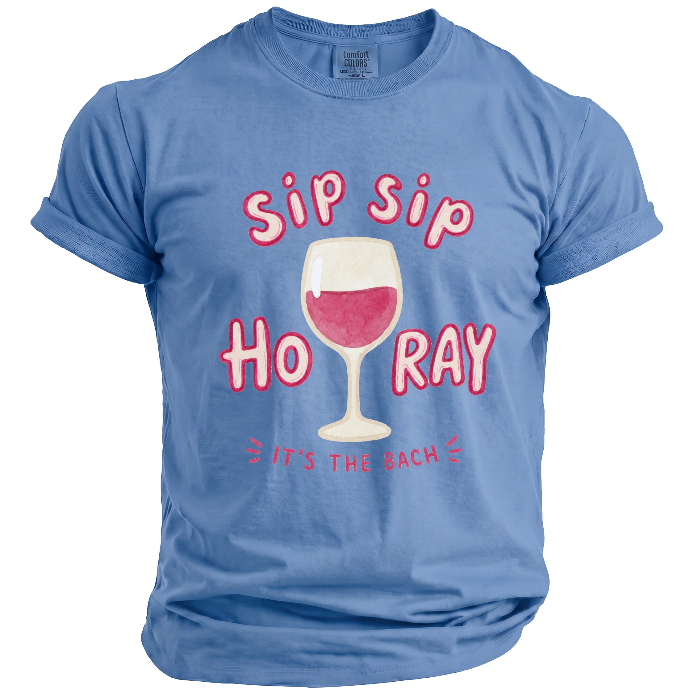 Blue t-shirt with "Sip Sip Ho Ray it's the Bach" text and wine glass graphic.