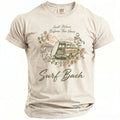 T-shirt with floral border, wood-paneled car, surfboard, and "Surf Bach" text.