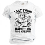 White t-shirt with a dragon golfer illustration and text "Last Swing Before The Ring Bachelor Golf Weekend".