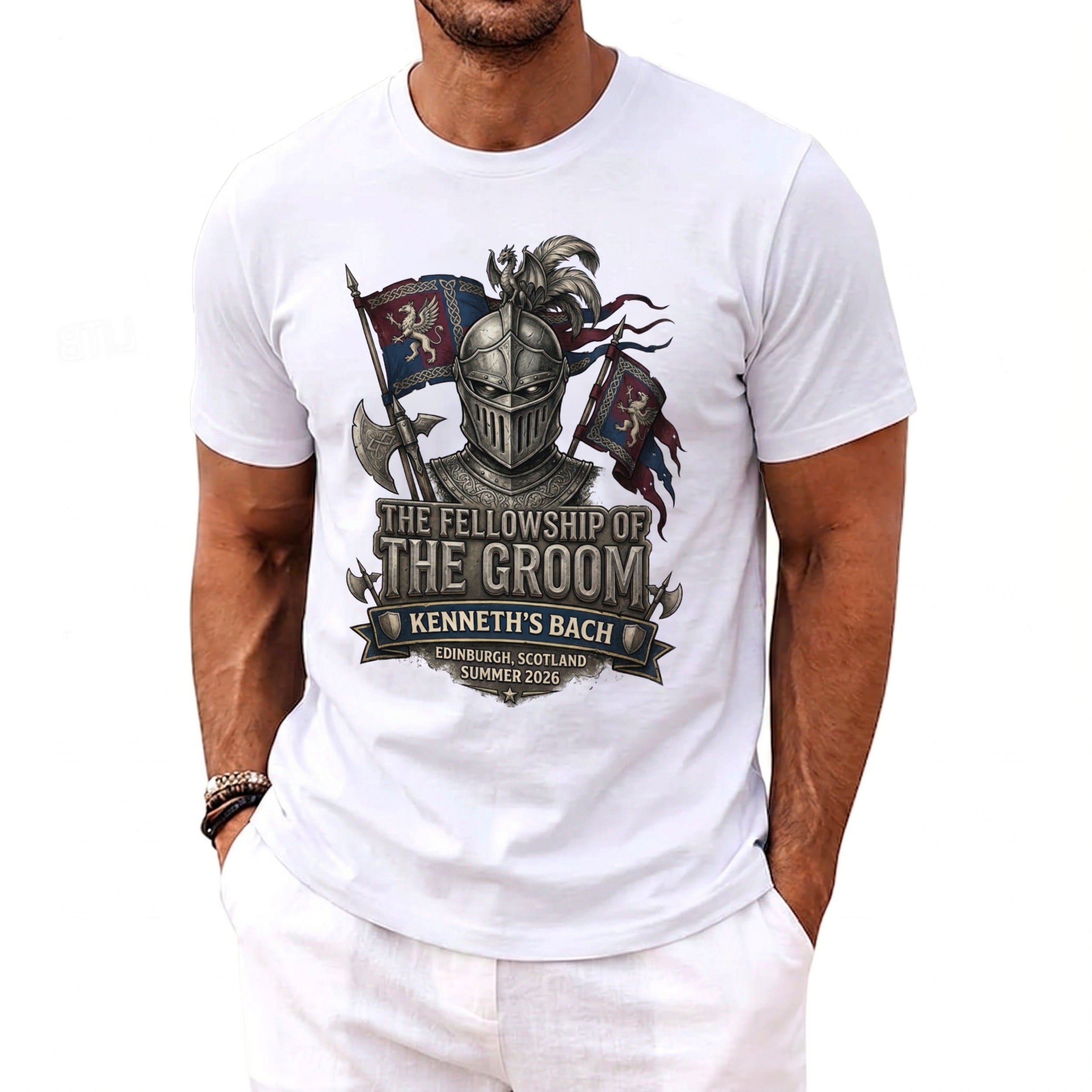 White t-shirt with knight, flags, and text "The Fellowship of the Groom Kenneth's Bach".
