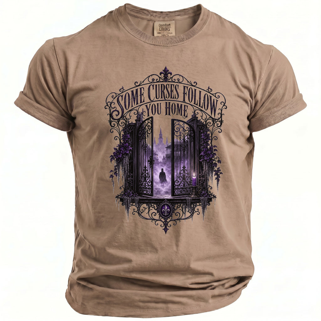 T-shirt with gothic gate graphic and text "SOME CURSES FOLLOW YOU HOME".