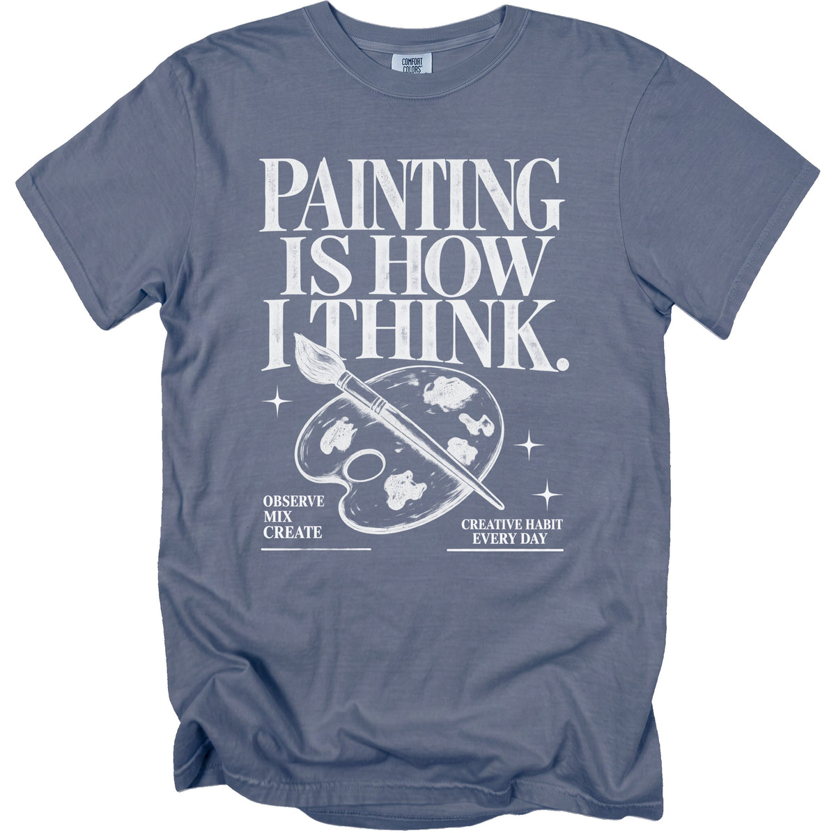 Blue t-shirt with white text "PAINTING IS HOW I THINK." and art palette.
