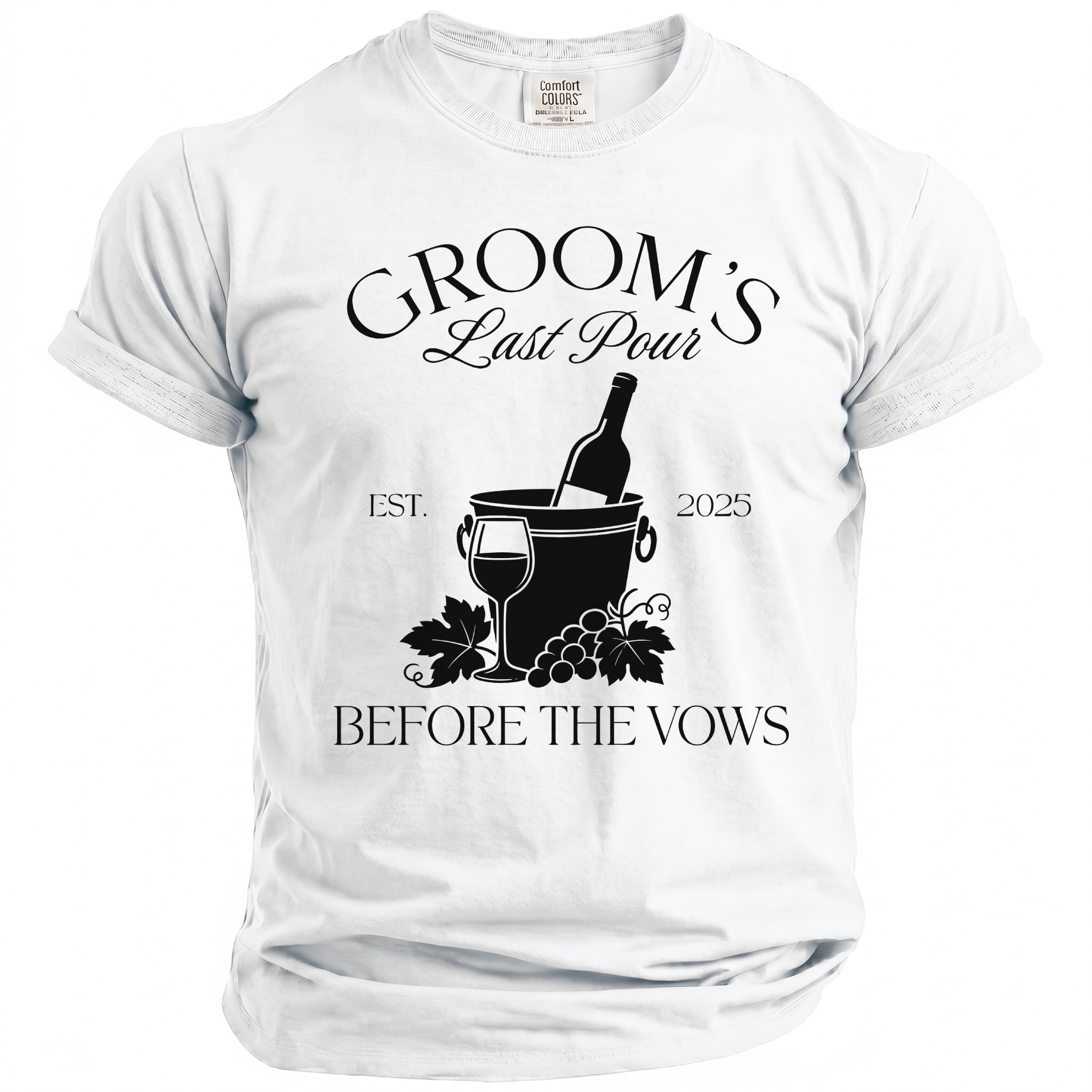 White t-shirt with black text reading "GROOM'S Last Pour EST. 2025 BEFORE THE VOWS".